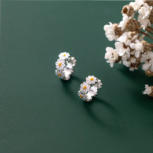 Créoles argent marguerites blanches centre jaune – Léo
