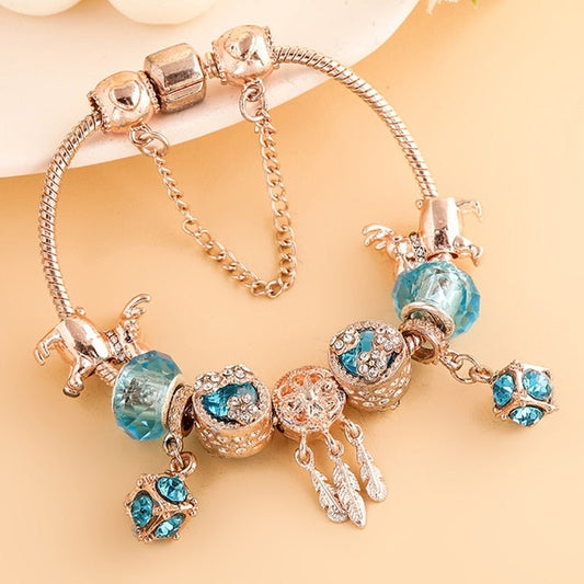 Bracelet breloques argent rosé zircon bleu – Léo