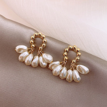 Boucles d’oreilles pendantes perles baroques plaqué or – Lise