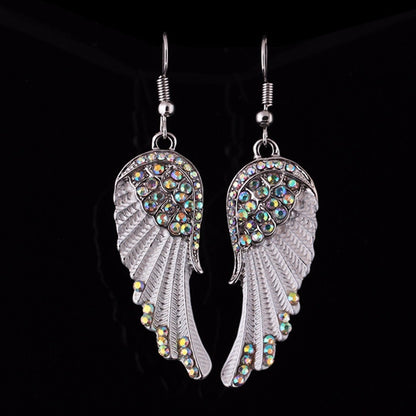 Boucles d’oreilles pendantes ailes argenté turquoise – Lila