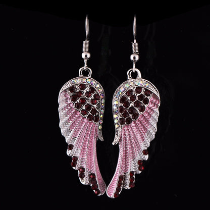 Boucles d’oreilles pendantes ailes strass bleu – Lila