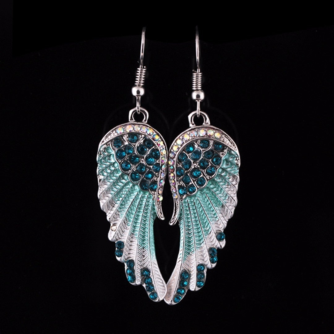 Boucles d’oreilles pendantes ailes argenté turquoise – Lila