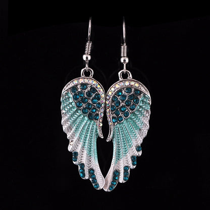 Boucles d’oreilles pendantes ailes argenté turquoise – Lila