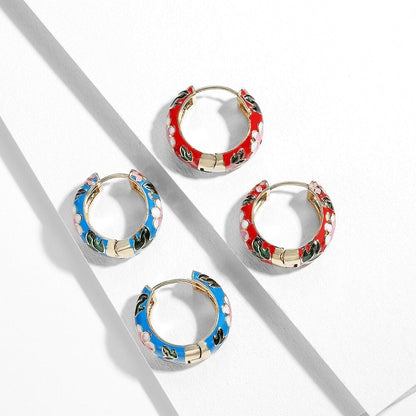 Créoles dorées émail bleu motif floral – Lila