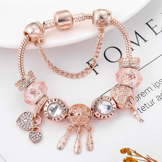 Bracelet breloques cœurs plumes argent – Lila