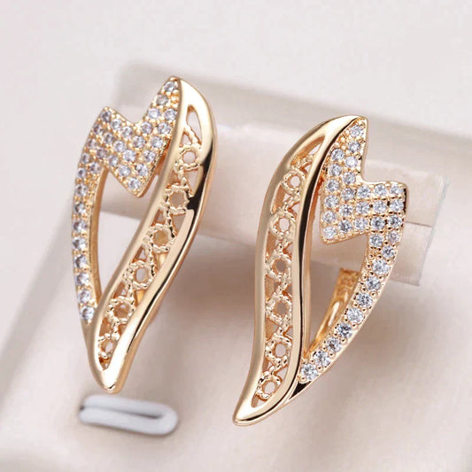 Boucles d’oreilles zigzag or zirconium – Lila