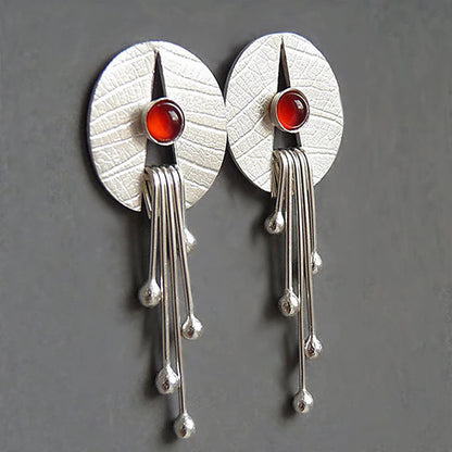 Boucles d’oreilles pendantes ajourées argent pierre rouge – Lise
