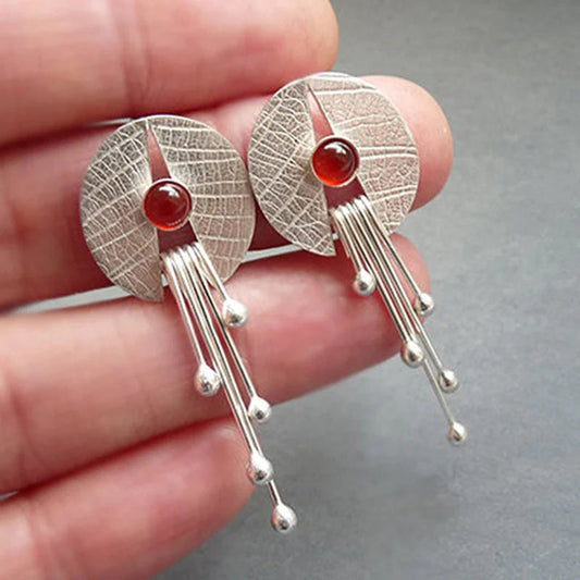 Boucles d’oreilles pendantes disque argent pierre rouge – Léo