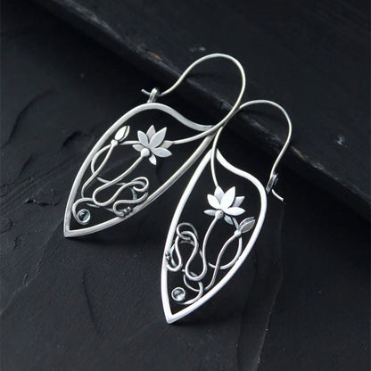 Boucles d’oreilles pendantes feuille argent pierres noires – Lila