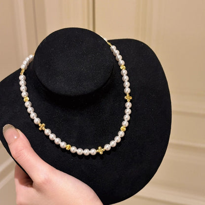 Collier de perles à trèfle à quatre feuilles