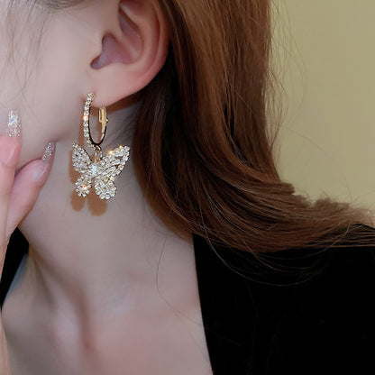 Boucles d’oreilles pendantes papillon or zircon – Lila