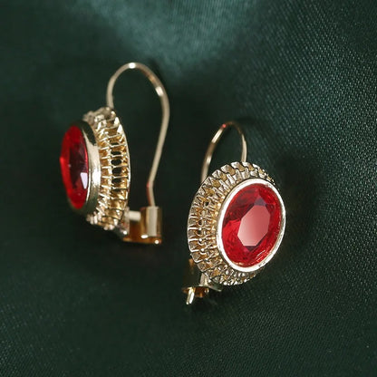 Boucles d'oreilles Plaquées or avec Pierres Rouges