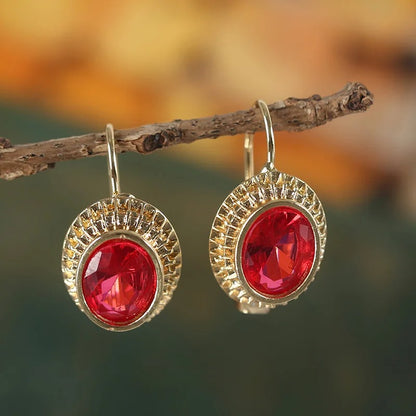 Boucles d'oreilles Plaquées or avec Pierres Rouges