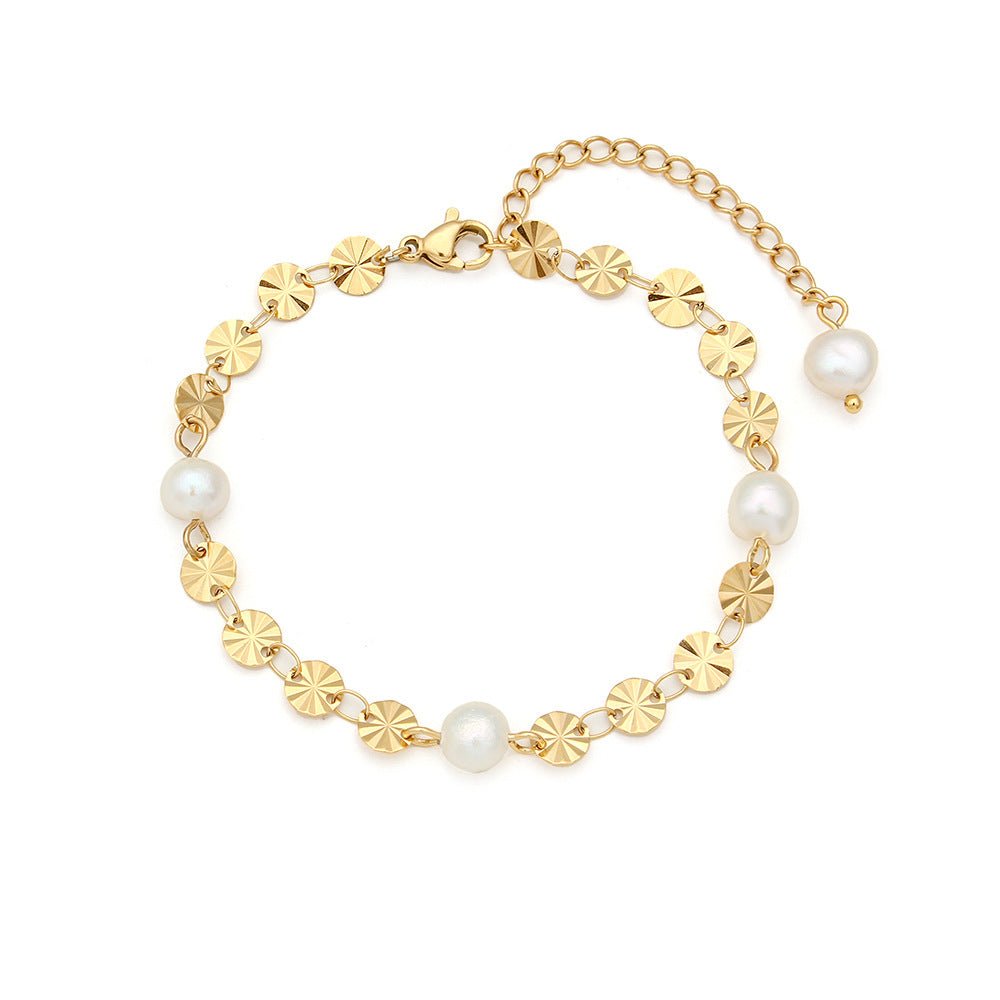 Bracelet perles blanches or motifs floraux – Liora