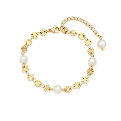 Bracelet perles blanches or motifs floraux – Liora