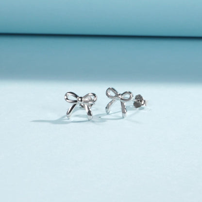 Clous d’oreilles nœud argent – Lise