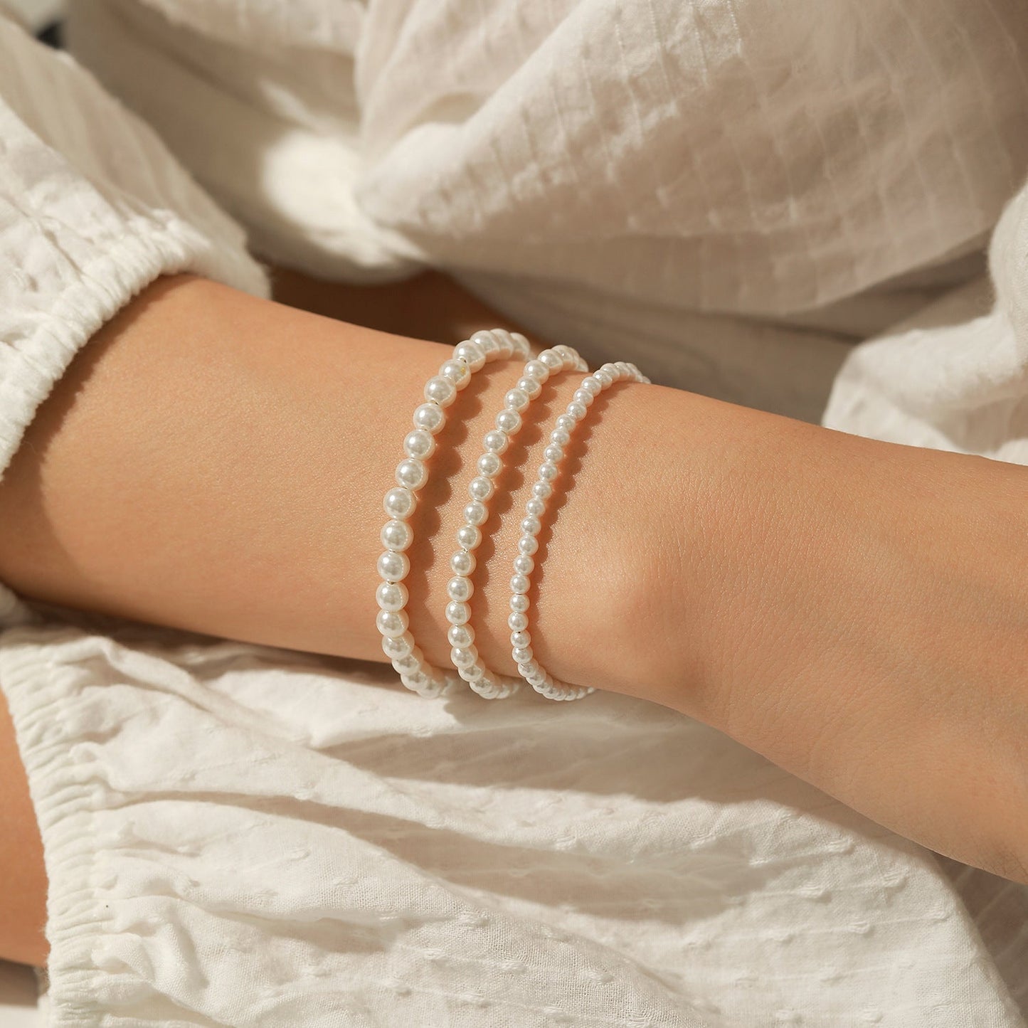 Bracelet perles blanches minimaliste élastique – Lila