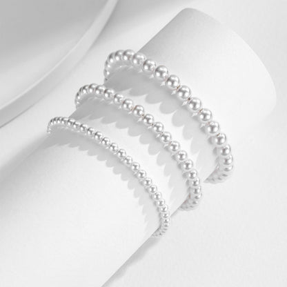 Bracelet perles blanches minimaliste élastique – Lila