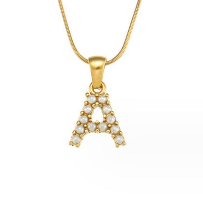 Collier doré avec pendentif lettre Perle – Sanne