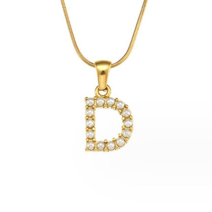 Collier doré avec pendentif lettre Perle – Sanne