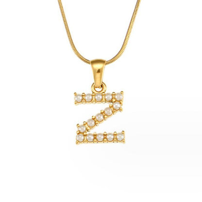 Collier doré avec pendentif lettre Perle – Sanne
