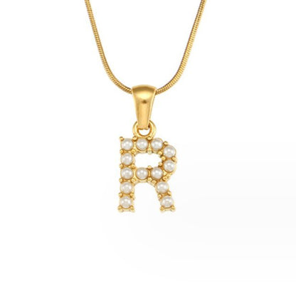 Collier doré avec pendentif lettre Perle – Sanne