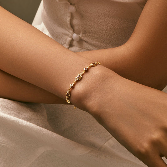 Bracelet maillons losange doré sertis – Léo